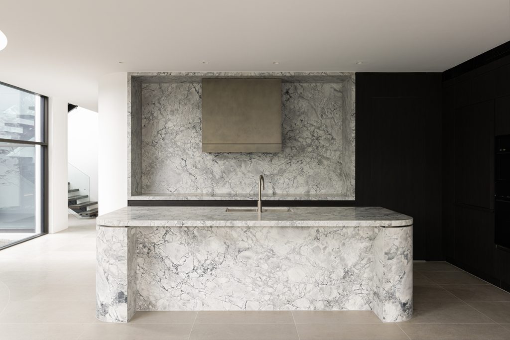 belmondo marble floor tiles against superwhite dolomite kitchen island